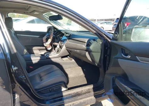 2017 Honda Civic Touring z USA, uszkodzony, nr VIN 19XFC1F98HE212550